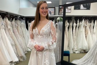 non-white wedding dress with detachablesleeves. see through lace bodice. Lavish bridal gown at Emmy's bridal